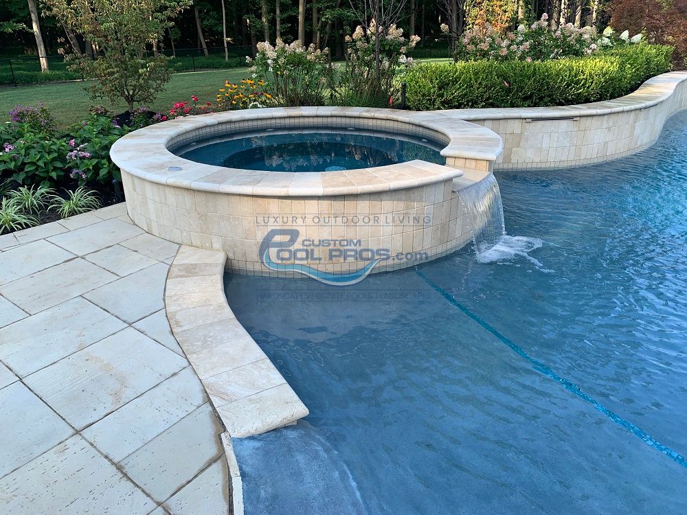 round spa as part of inground swimming pool installation, inground pool builders