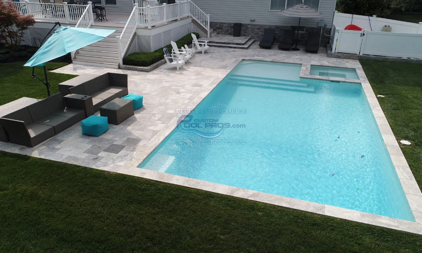 inground pool with light blue turquoise water color plaster finish, luxury pool, inground pool